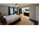 This bedroom has an ensuite bath with a shower and a double vanity with a granite countertop at 562 Nelson Dr, Brownsburg, IN 46112