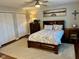 Cozy bedroom with neutral walls, a large bed, and ample closet space at 562 Nelson Dr, Brownsburg, IN 46112