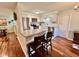 Updated kitchen with stainless steel appliances and breakfast bar overlooking the living area at 562 Nelson Dr, Brownsburg, IN 46112