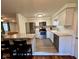 Well-equipped kitchen featuring stainless steel appliances, granite countertops, and a breakfast bar at 562 Nelson Dr, Brownsburg, IN 46112