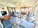 Bright sunroom boasts comfortable seating, a dining area, and plenty of natural light for a relaxing indoor space at 562 Nelson Dr, Brownsburg, IN 46112