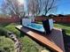 Backyard swim spa features a spacious design, integrated into a wooden deck and ready for relaxation and fitness at 562 Nelson Dr, Brownsburg, IN 46112