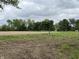 A sprawling vacant lot, ready for development, features a mix of grass and arable land at 11 S 1050 W, Jamestown, IN 46147