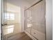 Bathroom featuring a glass shower and open view to bedroom and window at 132 Velvet Hat Rd, Danville, IN 46122