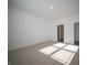 Carpeted bedroom with natural light and a view into an ensuite bathroom at 132 Velvet Hat Rd, Danville, IN 46122