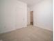 Bright bedroom featuring carpet floors and an open doorway at 132 Velvet Hat Rd, Danville, IN 46122