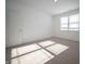 Carpeted bedroom features a window and an interior door at 132 Velvet Hat Rd, Danville, IN 46122
