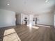 Spacious open-concept kitchen and living area with recessed lighting and stainless steel appliances at 132 Velvet Hat Rd, Danville, IN 46122