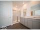 Bathroom featuring double sink vanity, framed mirrors, and glass enclosed shower at 120 Velvet Hat Rd, Danville, IN 46122