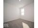 A simple bedroom with a neutral carpet, window, and a fresh, clean feel at 120 Velvet Hat Rd, Danville, IN 46122