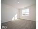 Spacious bedroom features large window offering plenty of natural light at 120 Velvet Hat Rd, Danville, IN 46122