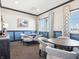 Comfortable area with tables, chairs and natural light at 120 Velvet Hat Rd, Danville, IN 46122
