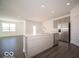 Open concept kitchen with stainless steel appliances and island, offering space for food prep and entertaining at 120 Velvet Hat Rd, Danville, IN 46122