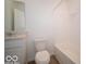 Bathroom featuring a tub/shower combo, white cabinets, and neutral countertops at 126 Velvet Hat Rd, Danville, IN 46122