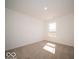 A bright bedroom featuring neutral carpet and a single window overlooking the outside at 126 Velvet Hat Rd, Danville, IN 46122