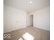 A comfortable bedroom with a double door closet and neutral carpet flooring at 126 Velvet Hat Rd, Danville, IN 46122