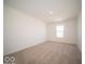 A spacious bedroom with neutral carpet and a window, offering a comfortable and adaptable space at 126 Velvet Hat Rd, Danville, IN 46122