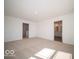 Spacious bedroom with neutral carpet and doorways, offering a flexible and adaptable area at 126 Velvet Hat Rd, Danville, IN 46122