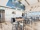 Bright clubhouse featuring a full kitchen with stainless steel appliances and ample seating at round tables at 126 Velvet Hat Rd, Danville, IN 46122