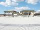 A modern community building with pergola overlooking a snow covered landscape at 126 Velvet Hat Rd, Danville, IN 46122
