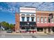 Charming street view of Mayberry Cafe and neighboring shops with a vintage aesthetic at 126 Velvet Hat Rd, Danville, IN 46122
