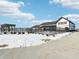A modern community building exterior with pergola, snow and landscaped areas at 126 Velvet Hat Rd, Danville, IN 46122