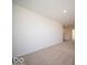 Hallway with neutral carpet and open view, offering a welcoming and inviting space at 126 Velvet Hat Rd, Danville, IN 46122