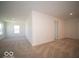 Spacious living room with neutral carpet and plenty of natural light, ideal for relaxation at 126 Velvet Hat Rd, Danville, IN 46122