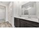 Bathroom featuring a double sink vanity and ample mirror space at 243 Hunters Ridge Dr, Danville, IN 46122