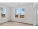 Sunlit bedroom with large windows offering pleasant views and a sliding glass door at 243 Hunters Ridge Dr, Danville, IN 46122