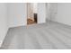 Large bedroom featuring neutral carpeting with a view into the bathroom at 243 Hunters Ridge Dr, Danville, IN 46122
