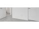 Bright bedroom with neutral carpet, white trim, and two white doors at 243 Hunters Ridge Dr, Danville, IN 46122