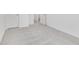 Bright bedroom with neutral carpet and two white doors at 243 Hunters Ridge Dr, Danville, IN 46122