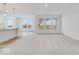 Expansive living area offers abundant natural light, plush carpeting, and views of the outdoors at 243 Hunters Ridge Dr, Danville, IN 46122