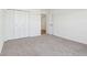 Spacious bedroom with neutral carpeting and double doors at 7098 Sterling Way, Brownsburg, IN 46112