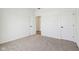 Spacious bedroom with neutral carpeting and access to hallway at 7098 Sterling Way, Brownsburg, IN 46112