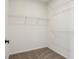 Spacious walk-in closet with wire shelving at 7098 Sterling Way, Brownsburg, IN 46112