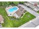 Overhead view of community pool and manicured landscaping; a perfect spot for relaxation and recreation in this neighborhood at 383 Carmelaire Ct, Carmel, IN 46032
