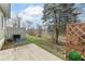Private backyard with patio and tree at 383 Carmelaire Ct, Carmel, IN 46032