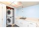 Basement laundry area with stackable washer and dryer at 383 Carmelaire Ct, Carmel, IN 46032