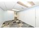 Finished basement features carpeted floors and ample storage space at 383 Carmelaire Ct, Carmel, IN 46032
