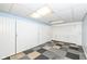 Storage area in the basement with built-in cabinets at 383 Carmelaire Ct, Carmel, IN 46032