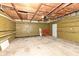 Attached garage with shelves and workbench at 383 Carmelaire Ct, Carmel, IN 46032