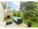 Private patio with comfortable outdoor seating and lush greenery, creating a relaxing outdoor space for entertainment at 383 Carmelaire Ct, Carmel, IN 46032