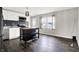 Bright kitchen featuring white cabinets, stainless steel appliances, and a butcher block island at 8902 Carla Dr, Indianapolis, IN 46219