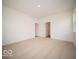 This carpeted bedroom provides lots of open space and natural light from the windows at 6322 Granby Dr, Whitestown, IN 46075