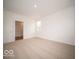 Large bedroom featuring neutral carpet, white walls, and natural light from a single window at 6322 Granby Dr, Whitestown, IN 46075