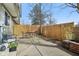 Fenced backyard with patio area, great for privacy, entertainment, and outdoor activities at 5527 Vin Rose Ln, Lawrence, IN 46226