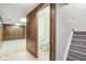 Half bath featuring a tiled floor and a standard toilet at 5527 Vin Rose Ln, Lawrence, IN 46226