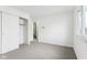 A bright bedroom featuring a closet and window for ample light at 5527 Vin Rose Ln, Lawrence, IN 46226